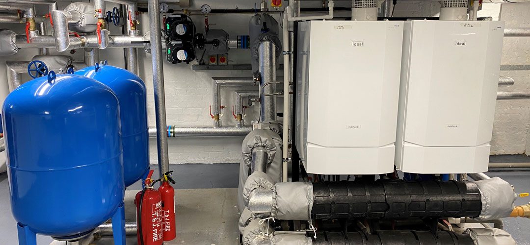 Boilers and pressurisation vessels in a plant room