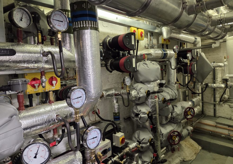 Gauges, pumps and insulated pipework at La Sainte Union School